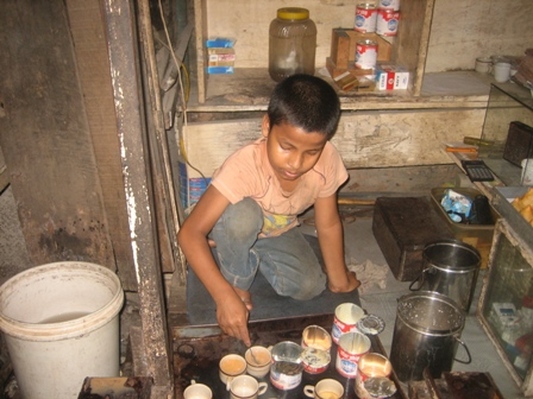 child making tea