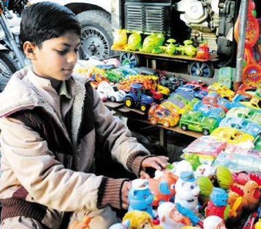 child selling toys